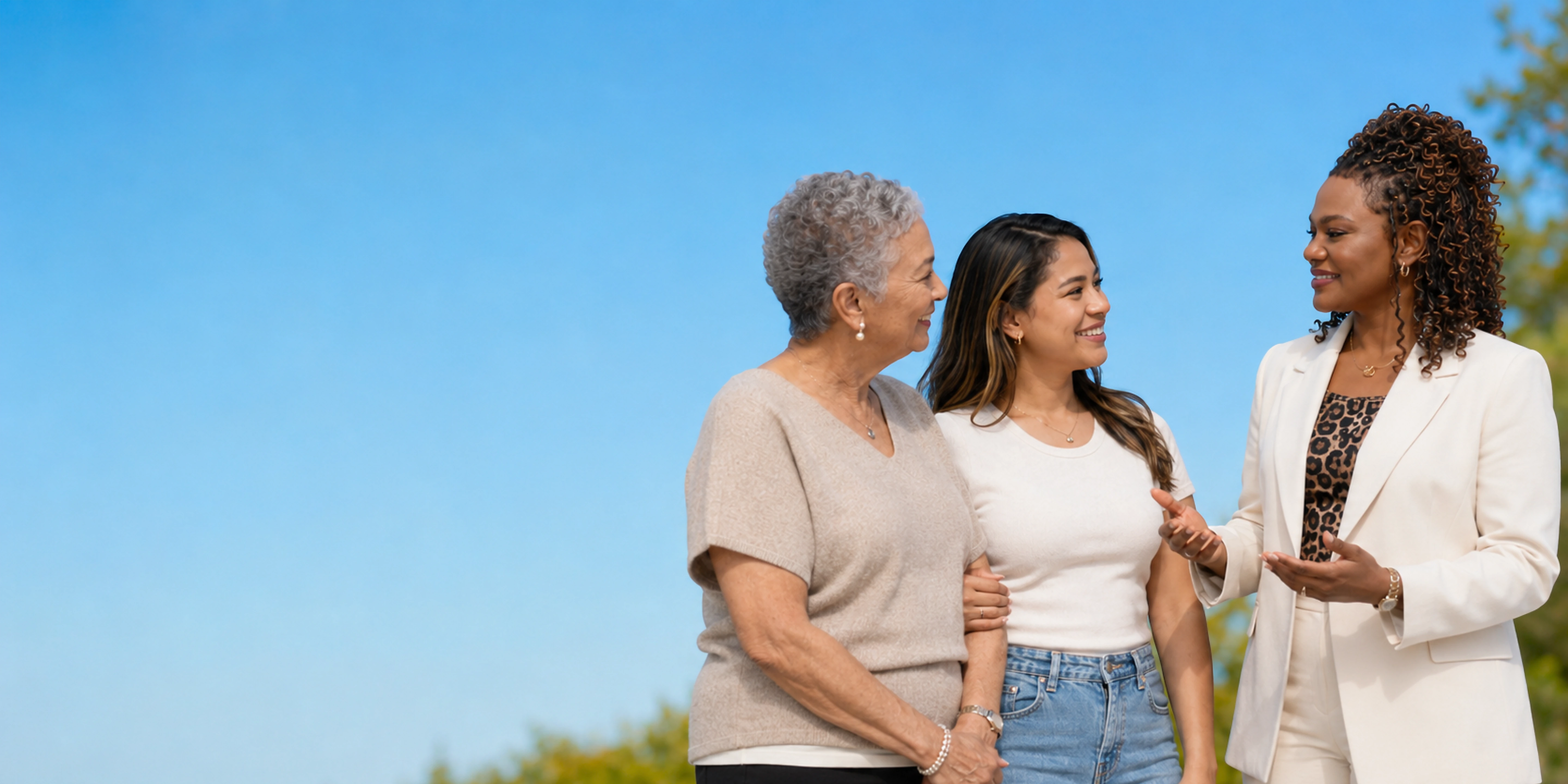 A family speaking with Dr. Ezeh-Aideyan outdoors